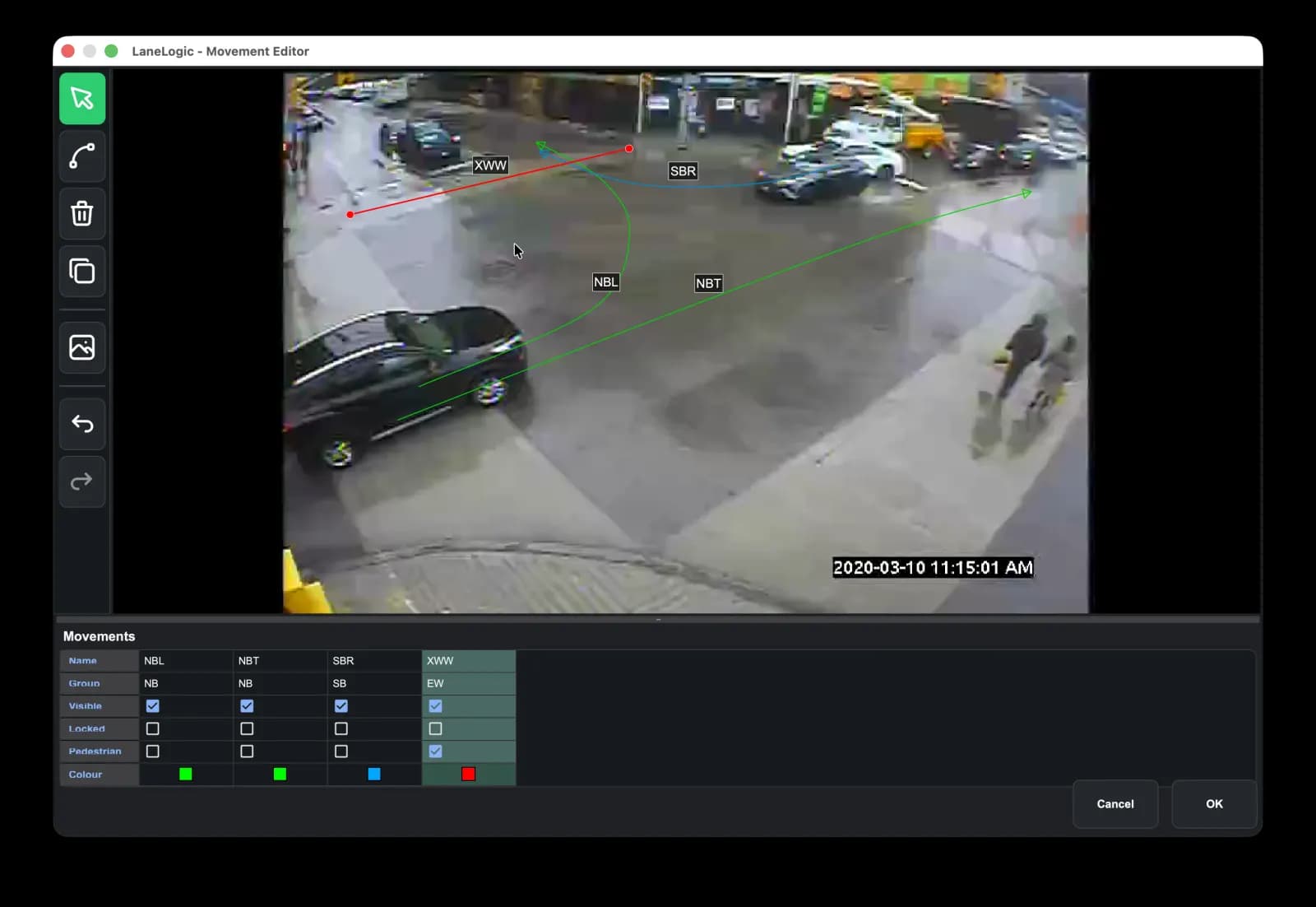 LaneLogic movement editor showing defined turning movement paths over intersection footage.
